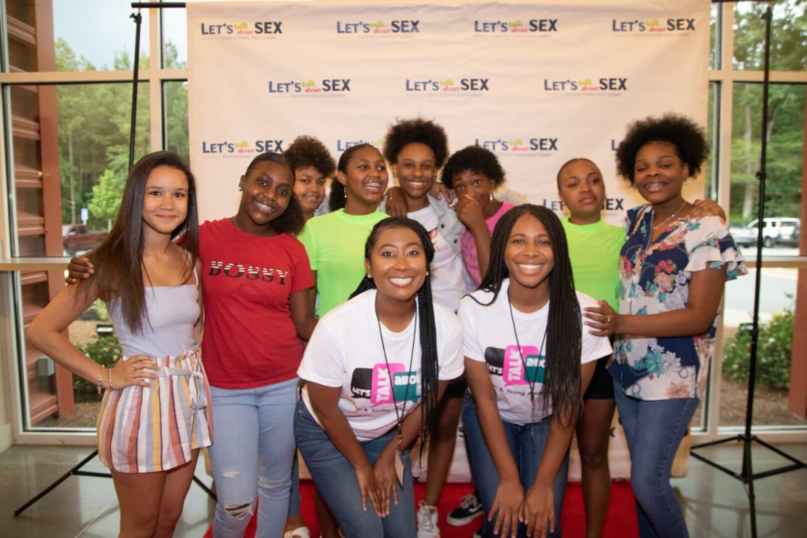 Speaker addressing youth and young adults at a Let’s Talk About Sex conference session