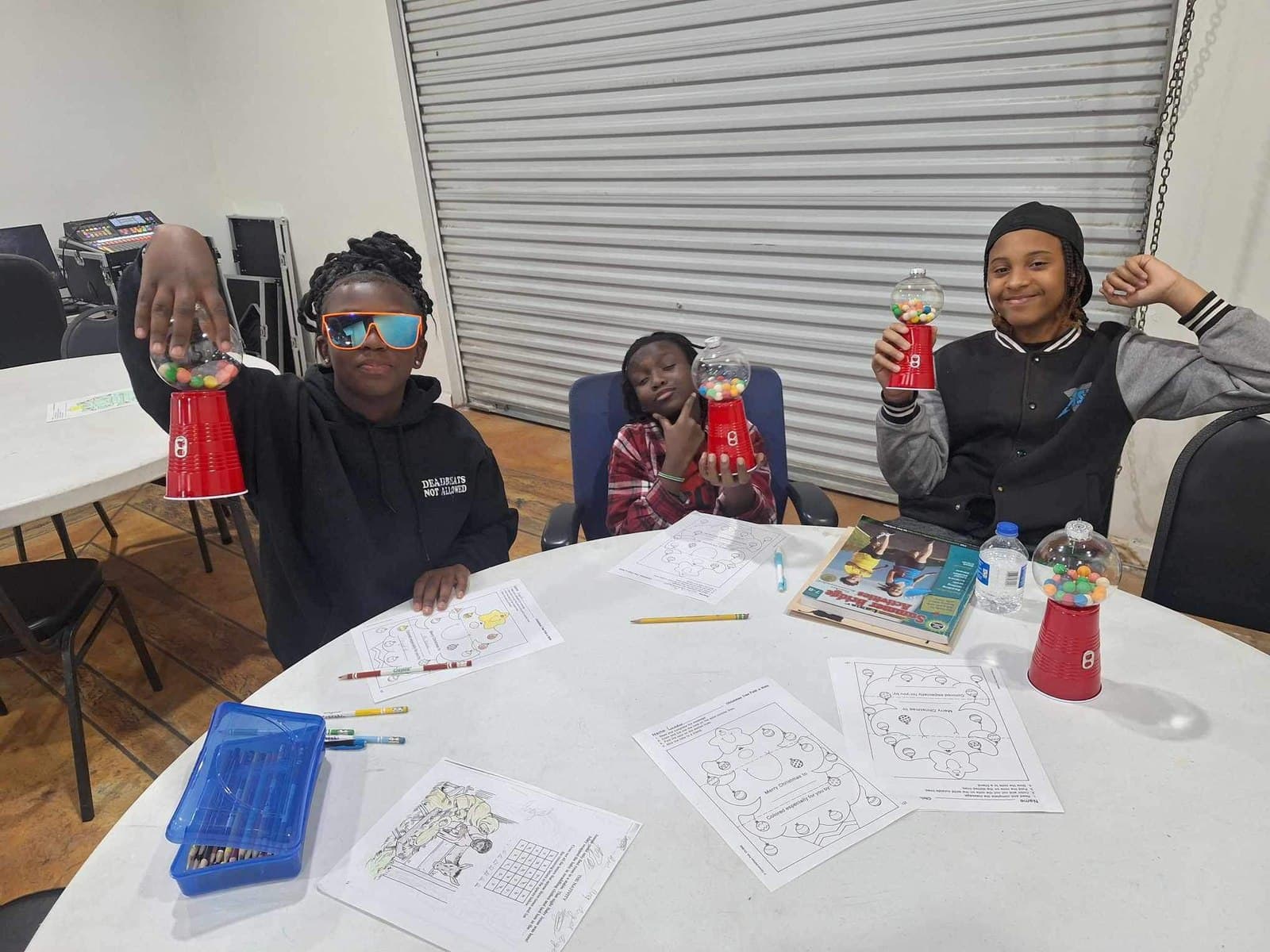 Students working through activity sheets together during the free after-school program